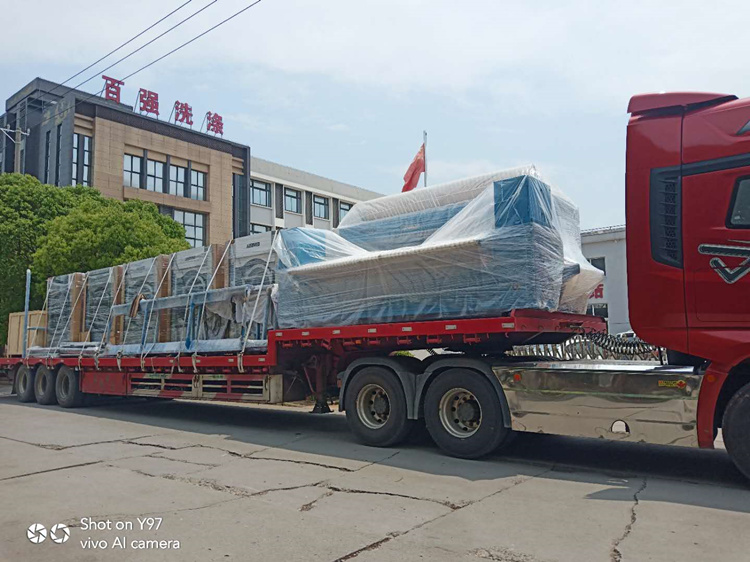 百強洗脫機、烘干機、燙平機等洗滌設備發貨海南-百強洗滌設備